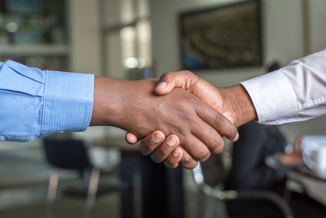 cta-bg two-people-shaking-hands-n95vmlxqm2i